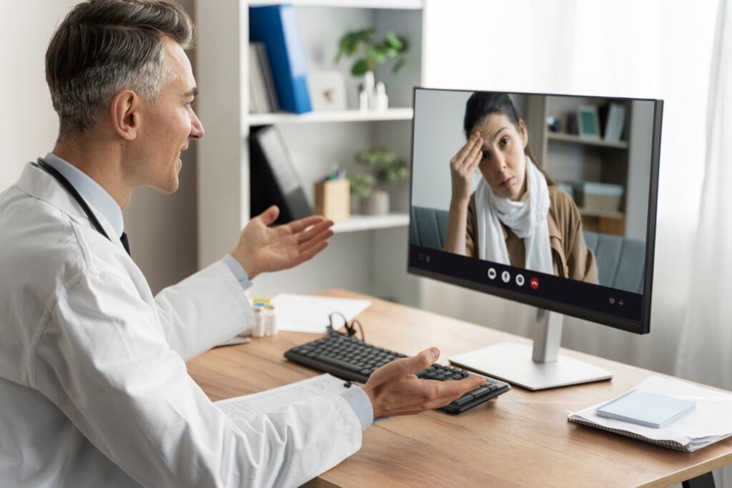 Home Doctor conducting online medical teleconsultation with patient