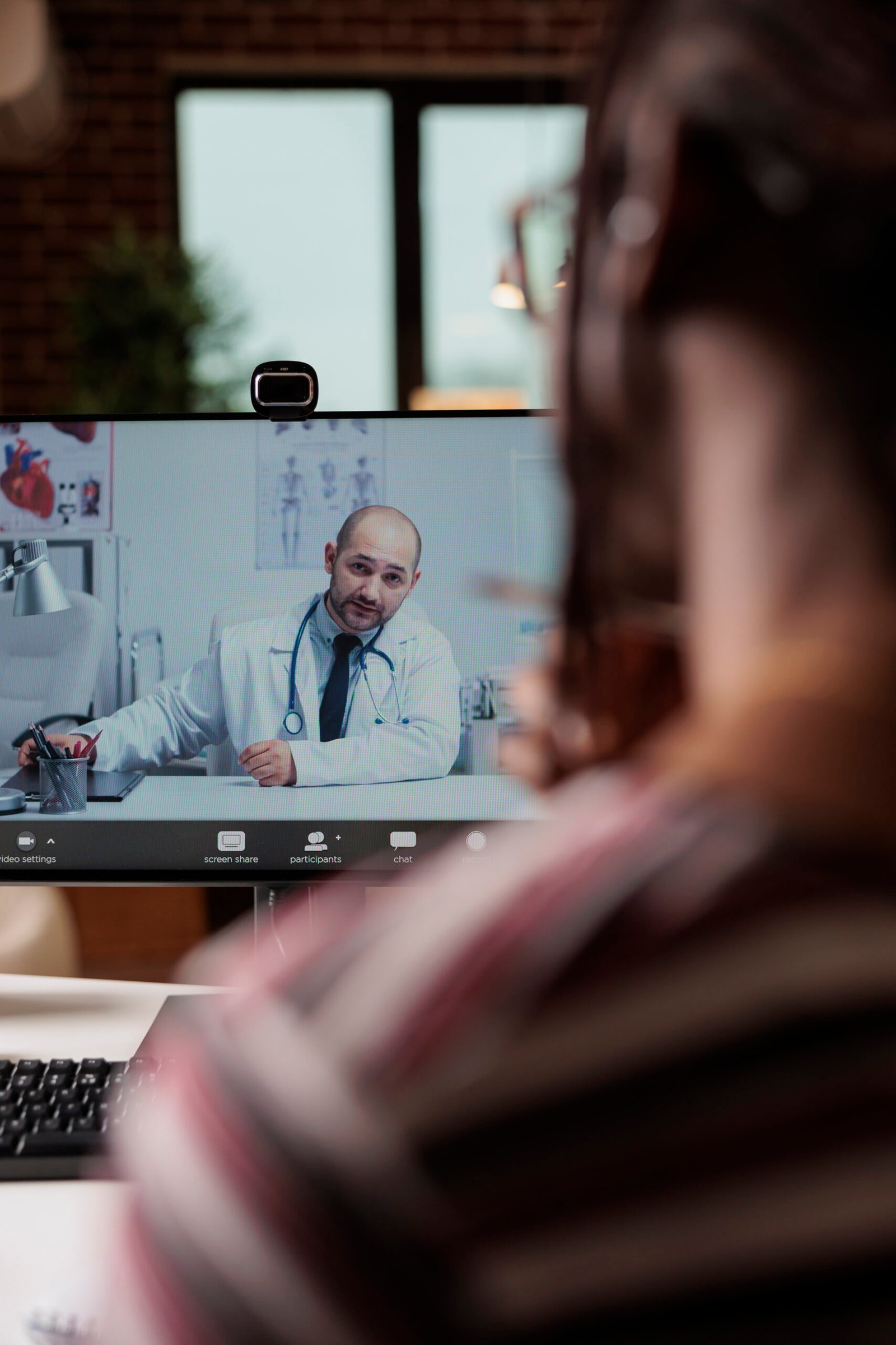 Home patient talking with doctor on videocall, medical specialist consultation